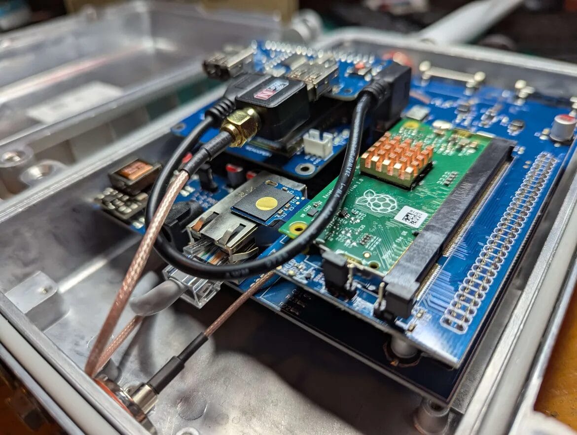 The Nebra carrier board with the Pi CM3 and a LoRa hat installed.